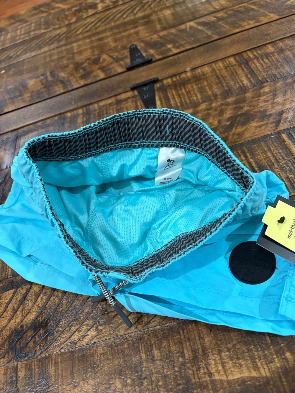 Swim Shorts with Waist Tie in blue turquoise color